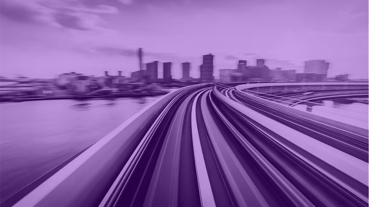 Stylized image of a raised freeway with a city's skyline in the background